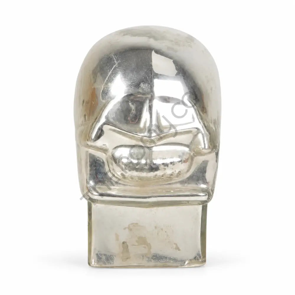 Modern abstract silver glass face sculpture for contemporary home and office tabletop decor.
