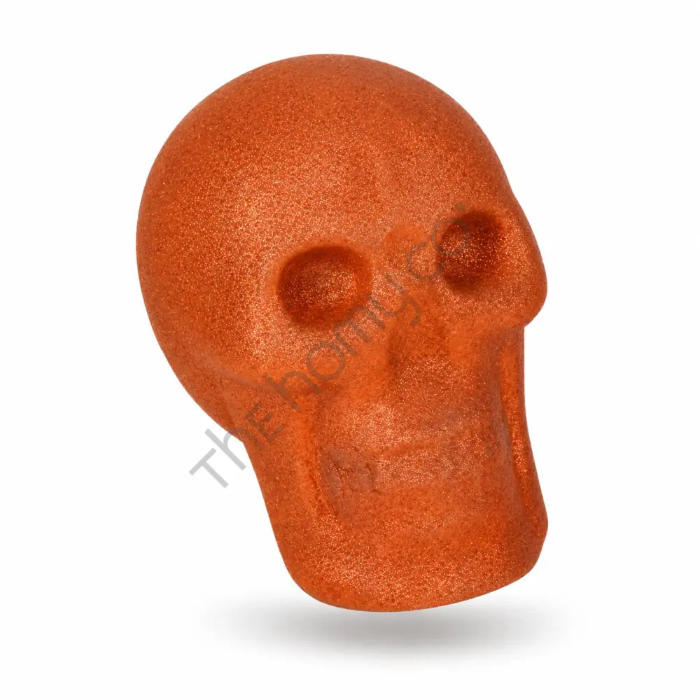 Modern abstract orange textured resin skull sculpture for gothic home decor and Halloween showpiece.