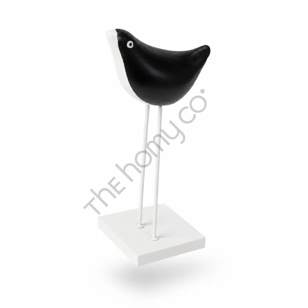 Elegant black and white metal bird figurine on a sleek stand for modern tabletop decor. - 2