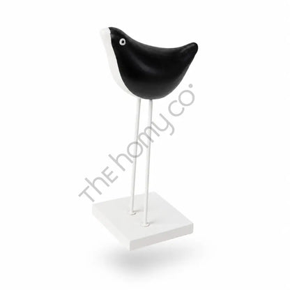 Elegant black and white metal bird figurine on a sleek stand for modern tabletop decor. - 2