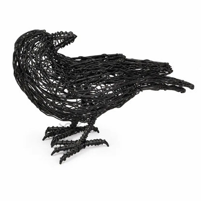 Handcrafted matte black wire crow sculpture with a minimalist open-frame design for modern tabletop decor. - 4
