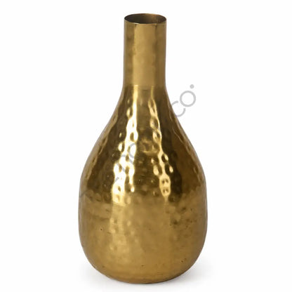 Modern decorative hammered gold metal bottle vase with a textured finish for home decor.