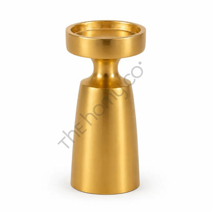 Modern gold minimalist metal candle holder with a sleek silhouette and metallic finish for elegant home decor.
