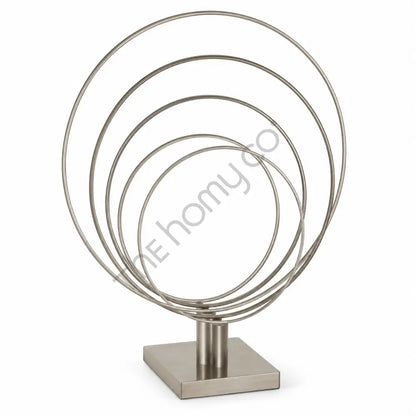 Modern abstract silver metal ring sculpture with a brushed finish on a sturdy black base for contemporary home decor.