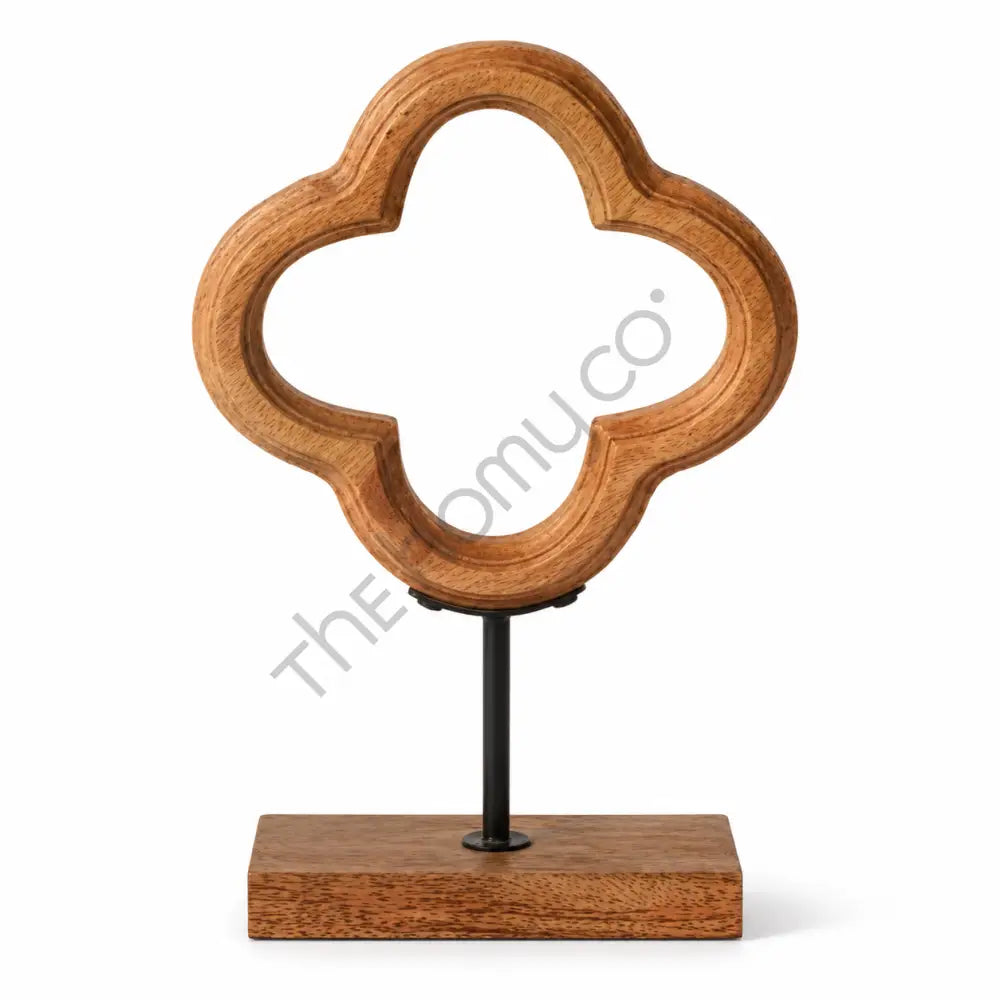 Modern wooden abstract sculpture with a geometric silhouette on a sleek metal stand for contemporary home decor.