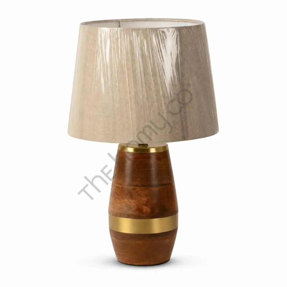 Modern wooden table lamp with a natural wood base, brass accents, and a soft beige fabric shade for home decor.