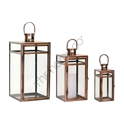 Bronze Moroccan iron lantern set with clear glass panels for festive candle holder decor. - 2