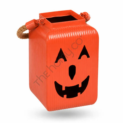 Orange pumpkin metal lantern with a jack-o-lantern face and rustic rope handles for Halloween decor. - 2