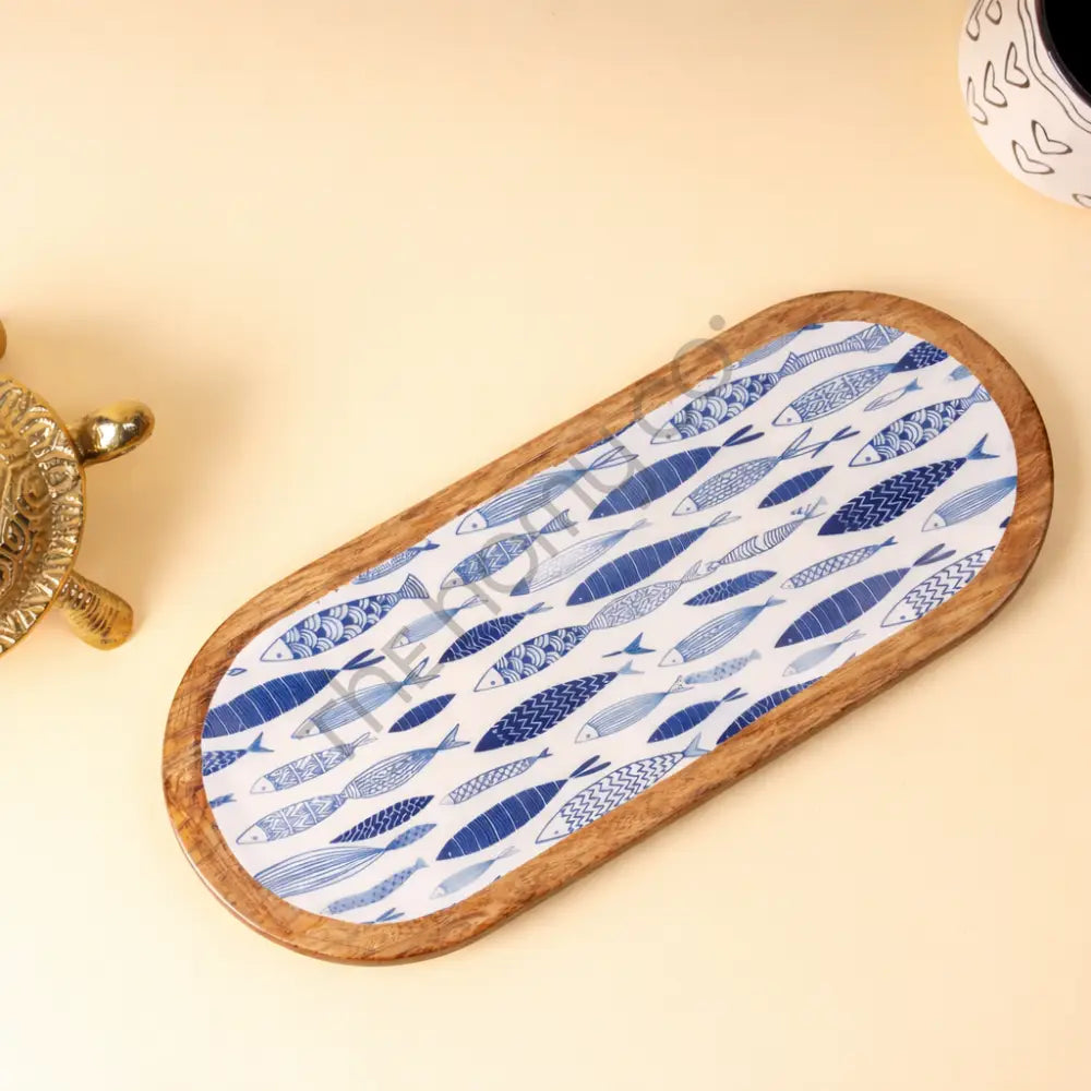 Oval wooden serving platter with decorative decaling for snacks and appetizers.