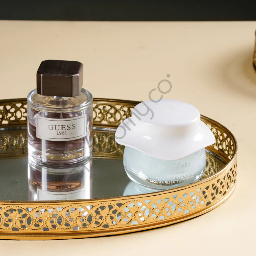 Round gold mirror vanity tray with decorative metal cutwork border for perfume and makeup organization. - 3