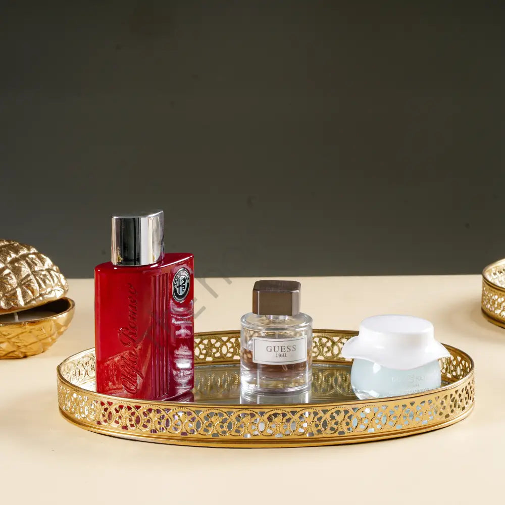 Round gold mirror vanity tray with decorative metal cutwork border for perfume and makeup organization. - 4