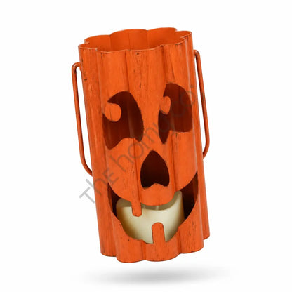 Rustic orange metal ghost face lantern with dripping cutout design for Halloween decor. - 2