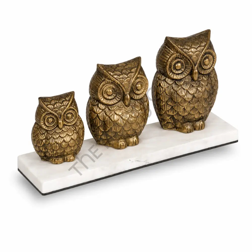 Set of 3 golden owl figurines with antique gold finish on premium marble bases for home and office decor. - 2