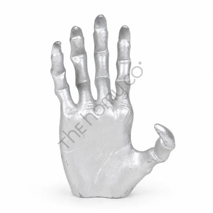 Metallic silver skeleton hand sculpture with detailed bone design for spooky Halloween and gothic home decor.
