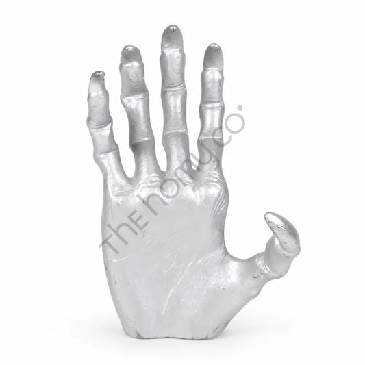 Metallic silver skeleton hand sculpture with detailed bone design for spooky Halloween and gothic home decor.